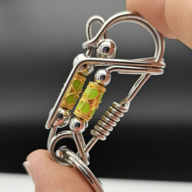 Luminous rotary steel ball keychain