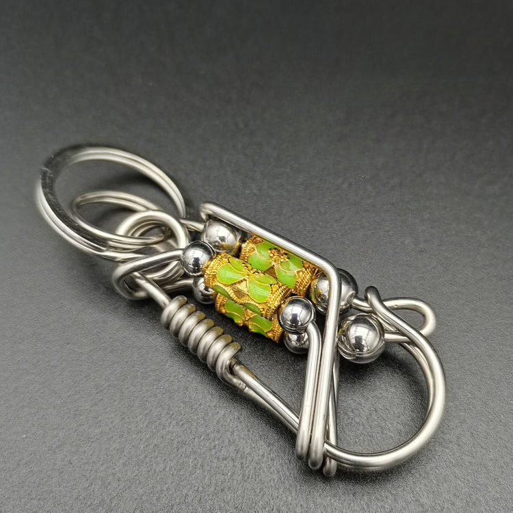 Luminous rotary steel ball keychain