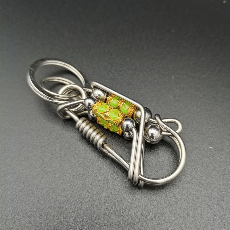 Luminous rotary steel ball keychain
