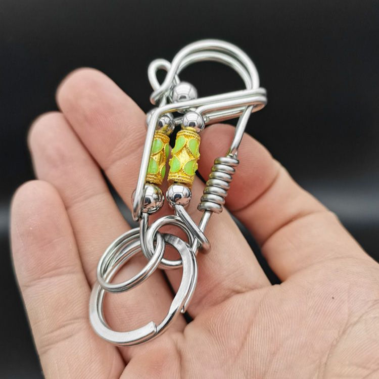 Luminous rotary steel ball keychain