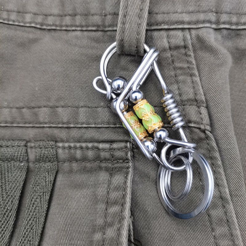Luminous rotary steel ball keychain