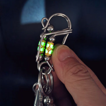 Luminous rotary steel ball keychain