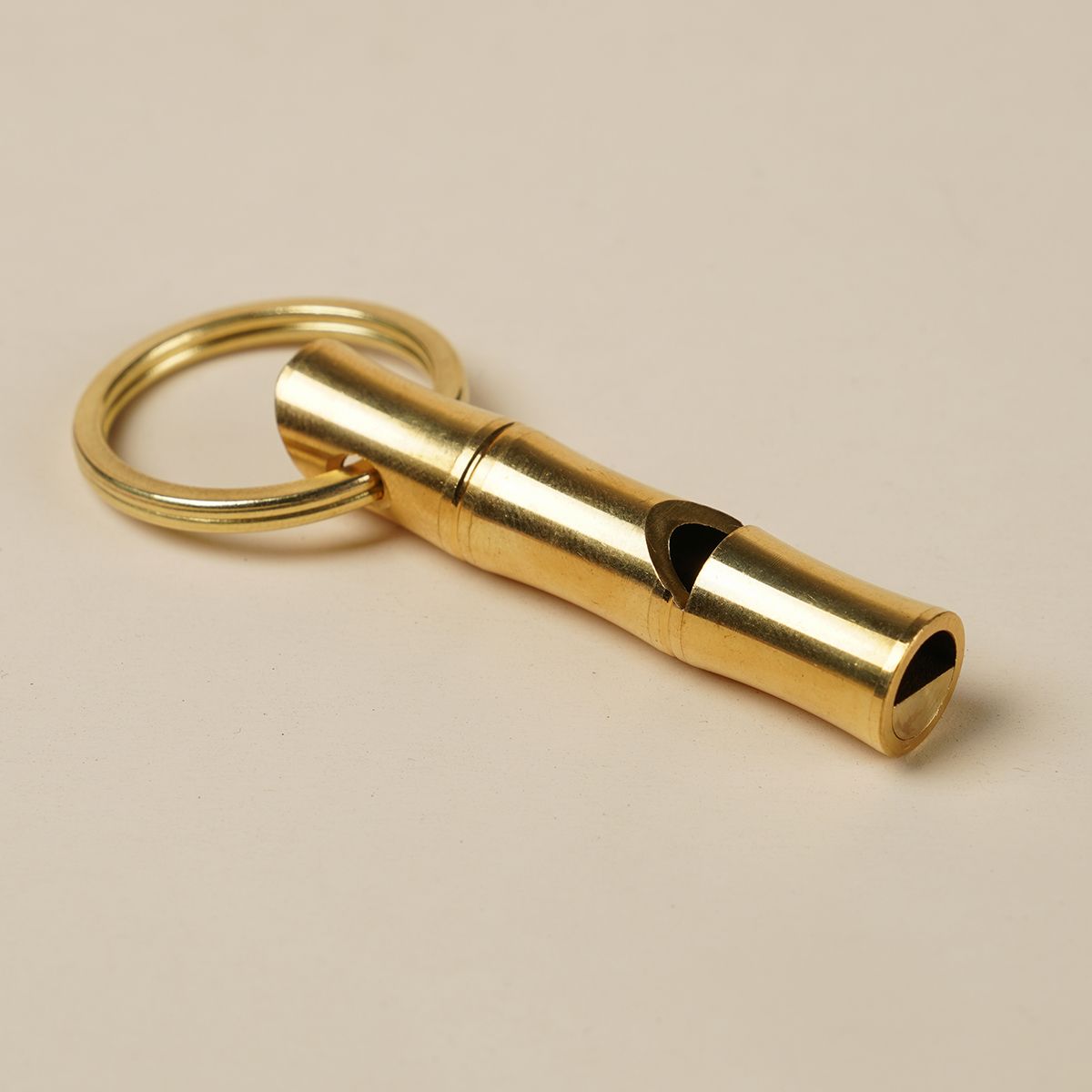 Brass whistle pendant