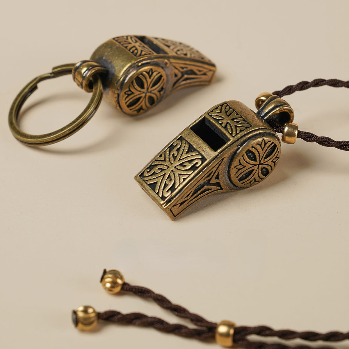 Brass whistle pendant