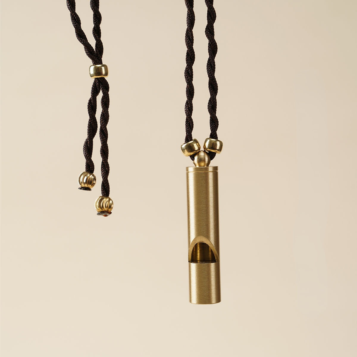 Brass whistle pendant